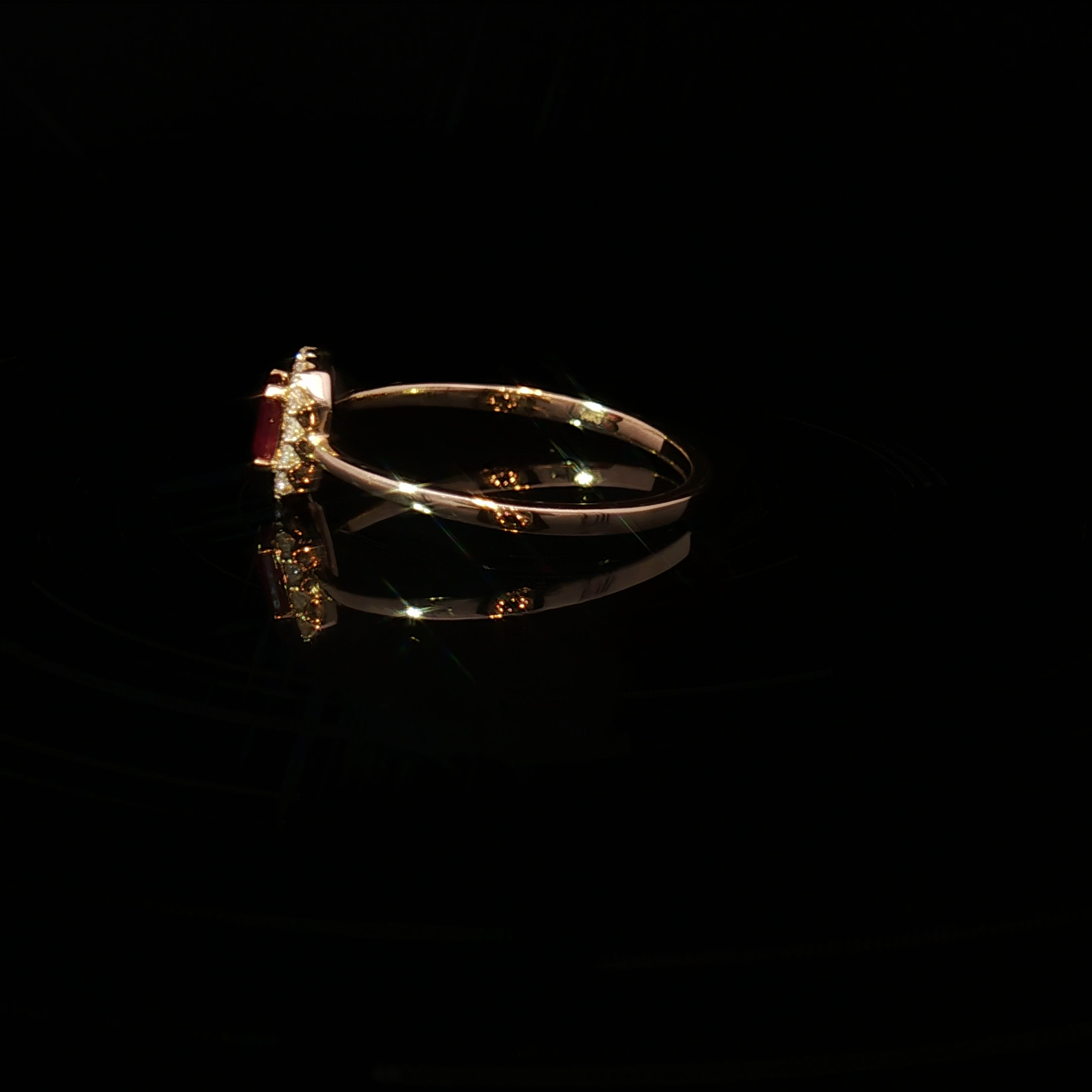 Yellow Gold Multistone Ring Featuring an Emerald Cut Ruby