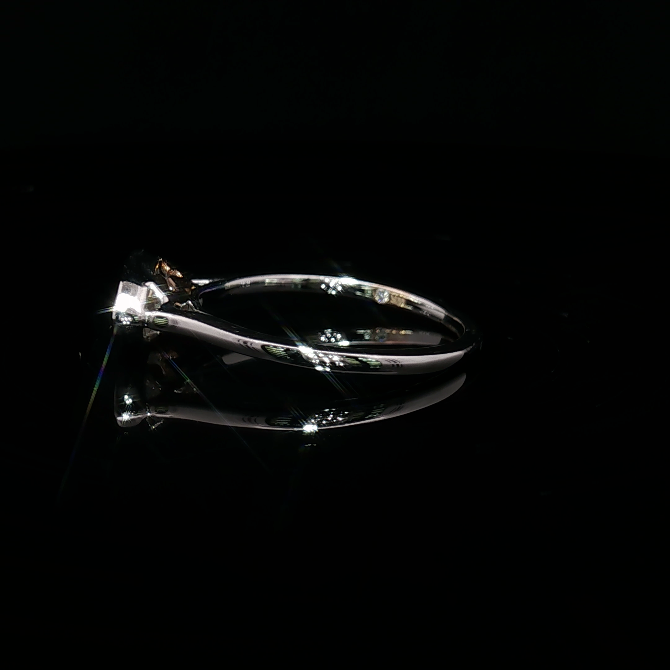 14K white Gold Solitaire Ring with Marquise Cut Diamond