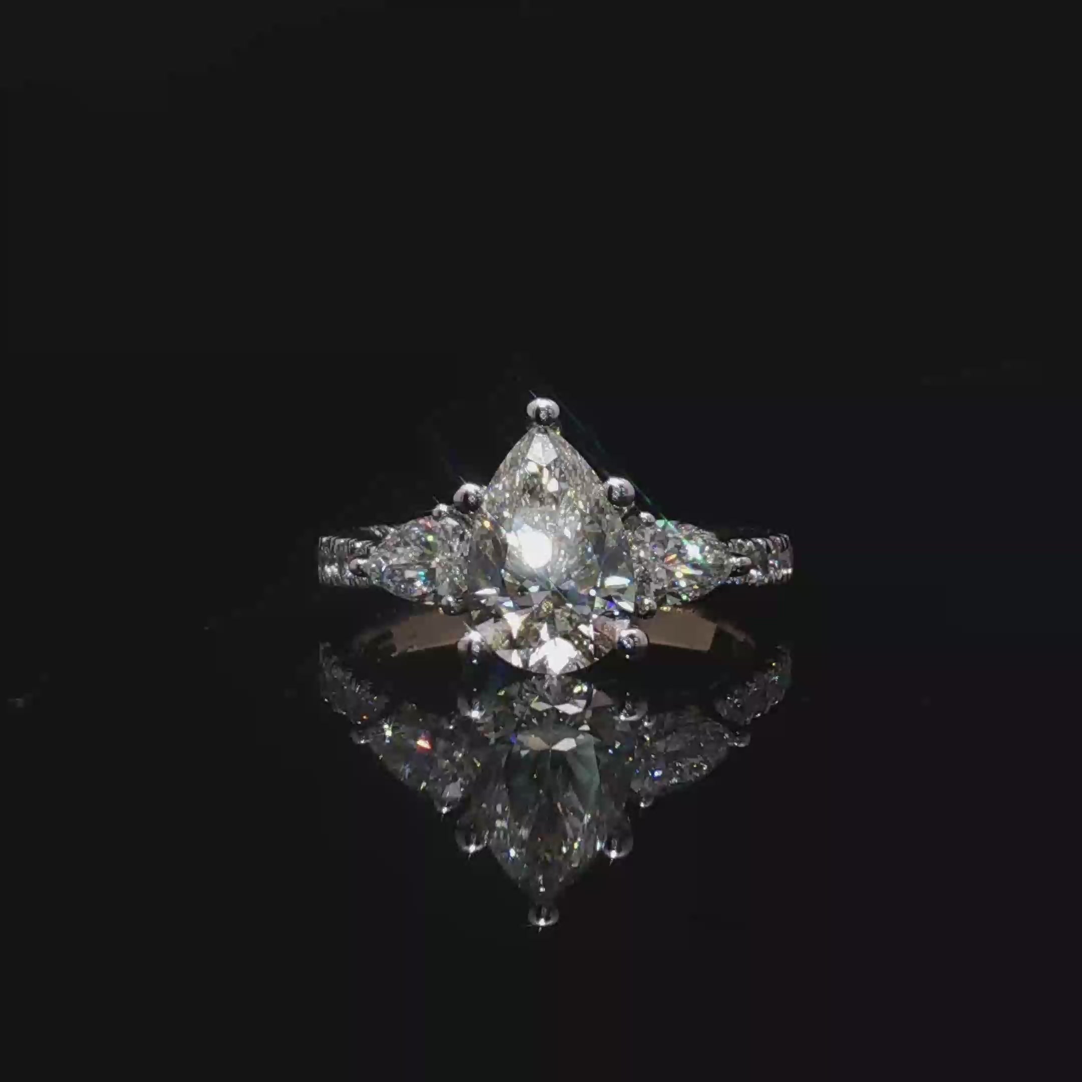 Pear Cut Diamond Multi-stone Ring in Yellow Gold